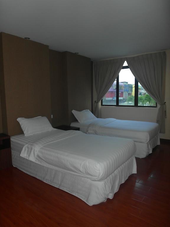 Mcity Inn Miri Szoba fotó